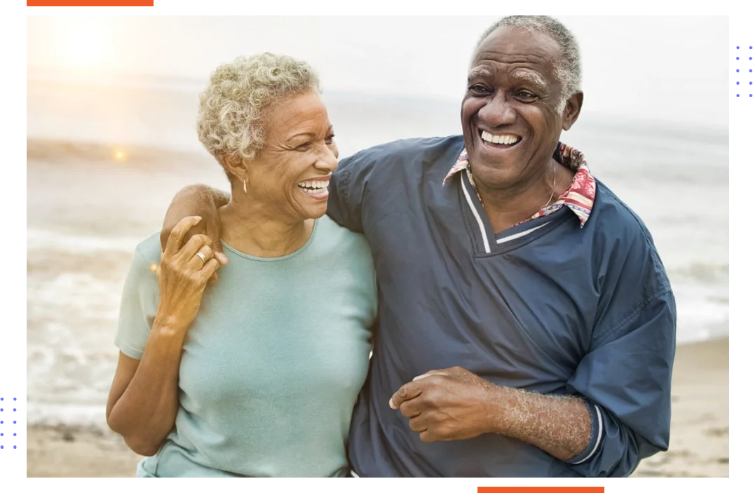 A man and woman smiling for the camera.