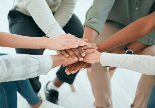 Group of hands showing teamwork spirit
